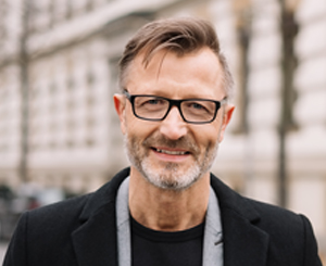 older man with glasses